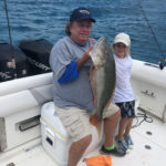 2020 - Mattie Johnson and his son Riley enjoyed a catching a huge 18 lb Mutton Snapper on the patches right in front of the Reef.  