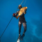 2020 - Stone Lyons spearfishing at 60’ north of Ocean Reef - Red Grouper. Photo taken by Sean Lyons.