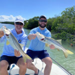 2021 - William and Jake Hinkebein caught 2 nice Snook at the same time on flats boat.  