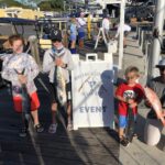 2021 Holiday Fishing tournament - Jr Angler awards - Timothy Asman, Wyatt Verillo, with Noah Asman, and dad Carl Asman